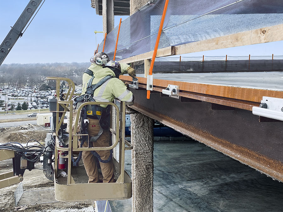 Construction work done on a high-rise building.