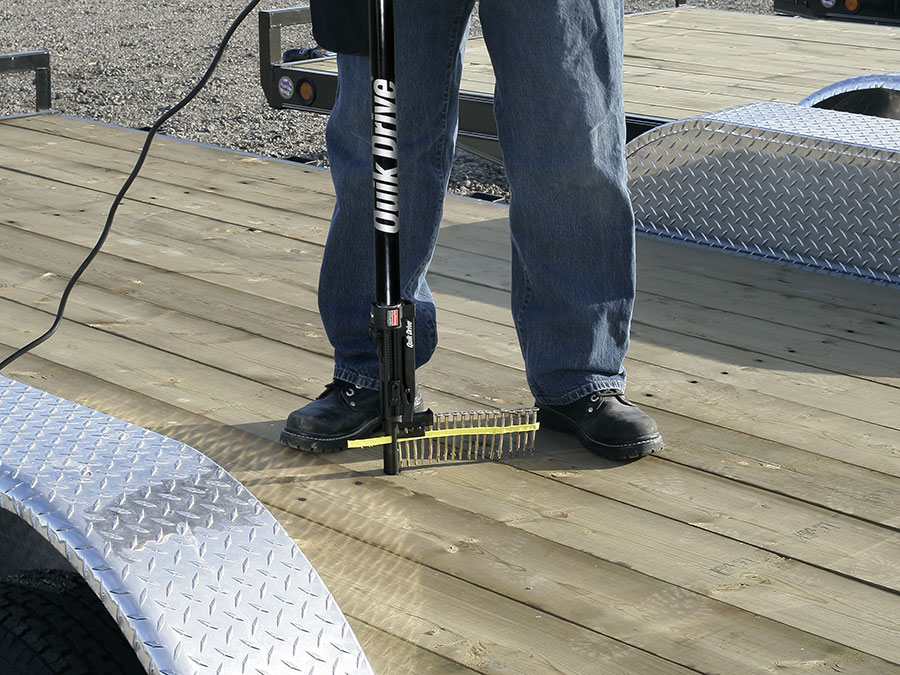 Installation of boards on a trailer using Quik Drive system.