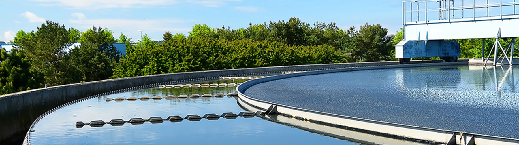 Overlooking part of a water reservoir with trees in background
