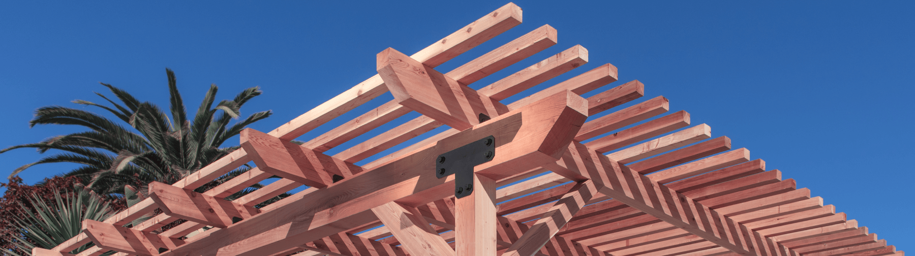 Metal connector on a wood pergola.