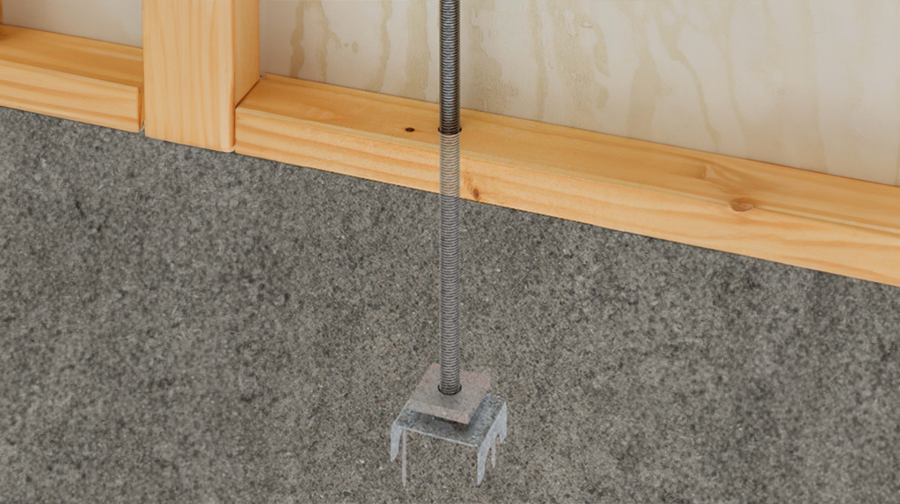 Render of ATS anchorage system installed through wooden beam and concrete.