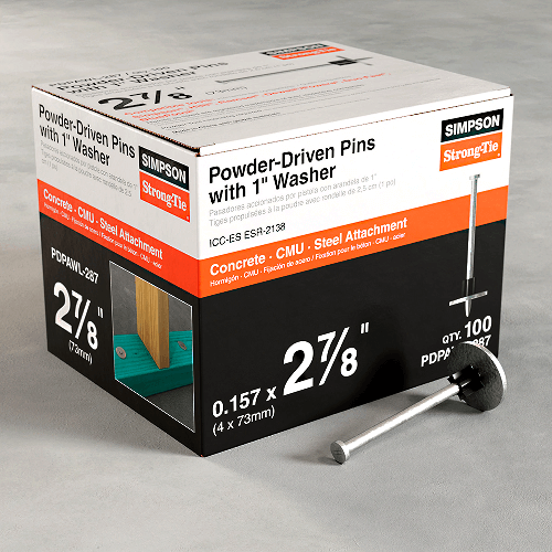Box of Simpson Strong-Tie powder-driven pins with 1" washer for concrete, CMU, and steel attachment. One pin with washer shown in front.