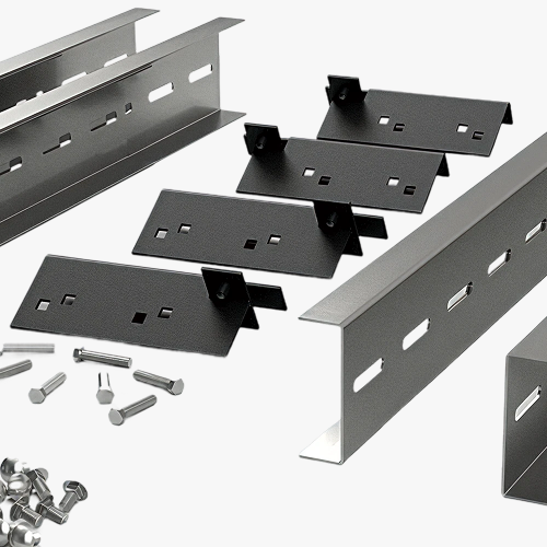 Steel QuickFrames components, including brackets, beams, and fasteners, displayed on a white surface, showing structural framing parts before assembly